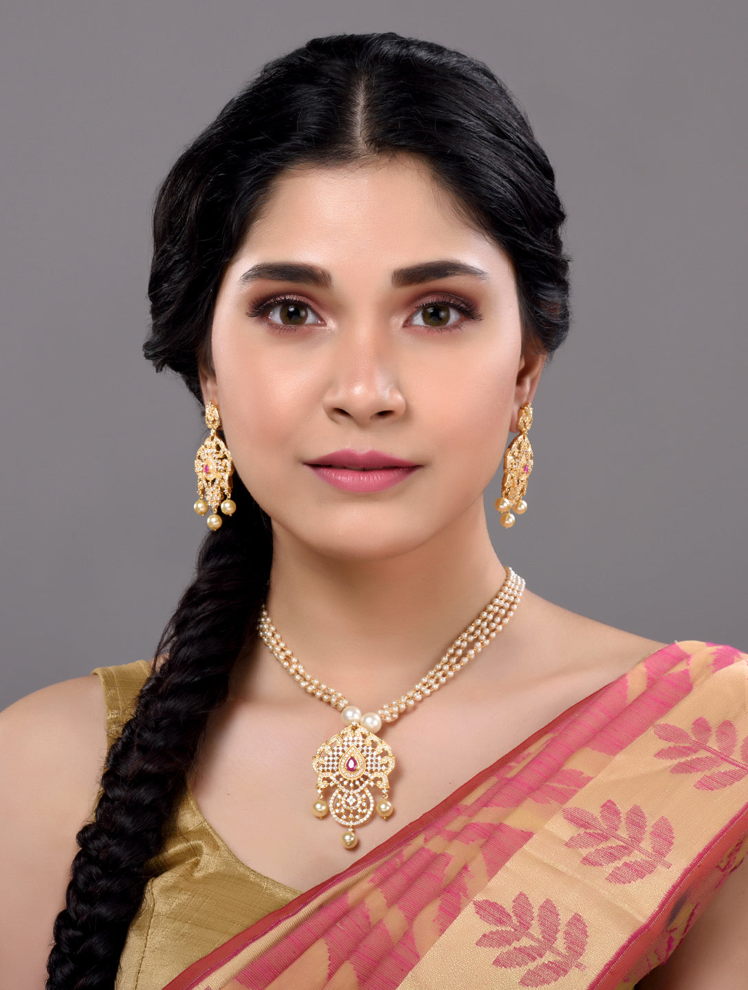 Gold Plated Red AD and Pearl Studded Traditional PendantNecklace White Pearl Mala and Earrings